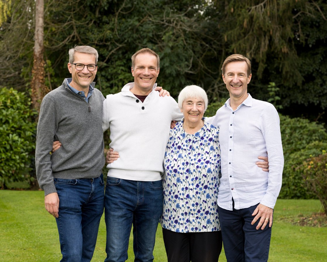 Extended family portrait celebrating 80th birthday in Surrey garden