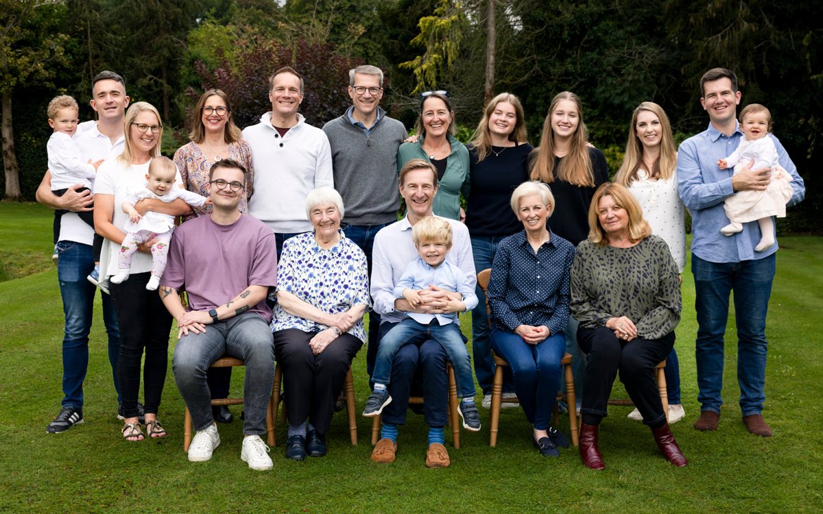 Multi-generational family reunion photo with 19 members in Surrey