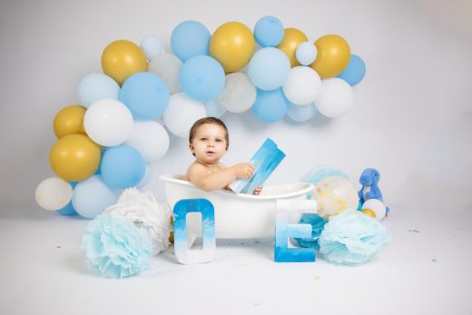 Gold, blue and white theme balloon arch