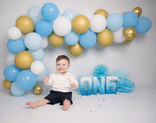 Gold, blue and white theme balloon arch