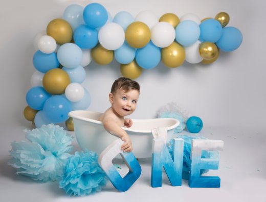 Gold, blue and white theme balloon arch