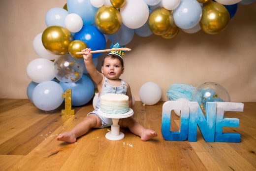 blue, gold and white theme cake smash