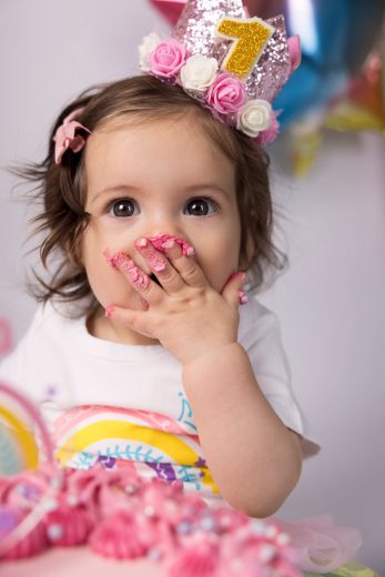 Baby eating cake